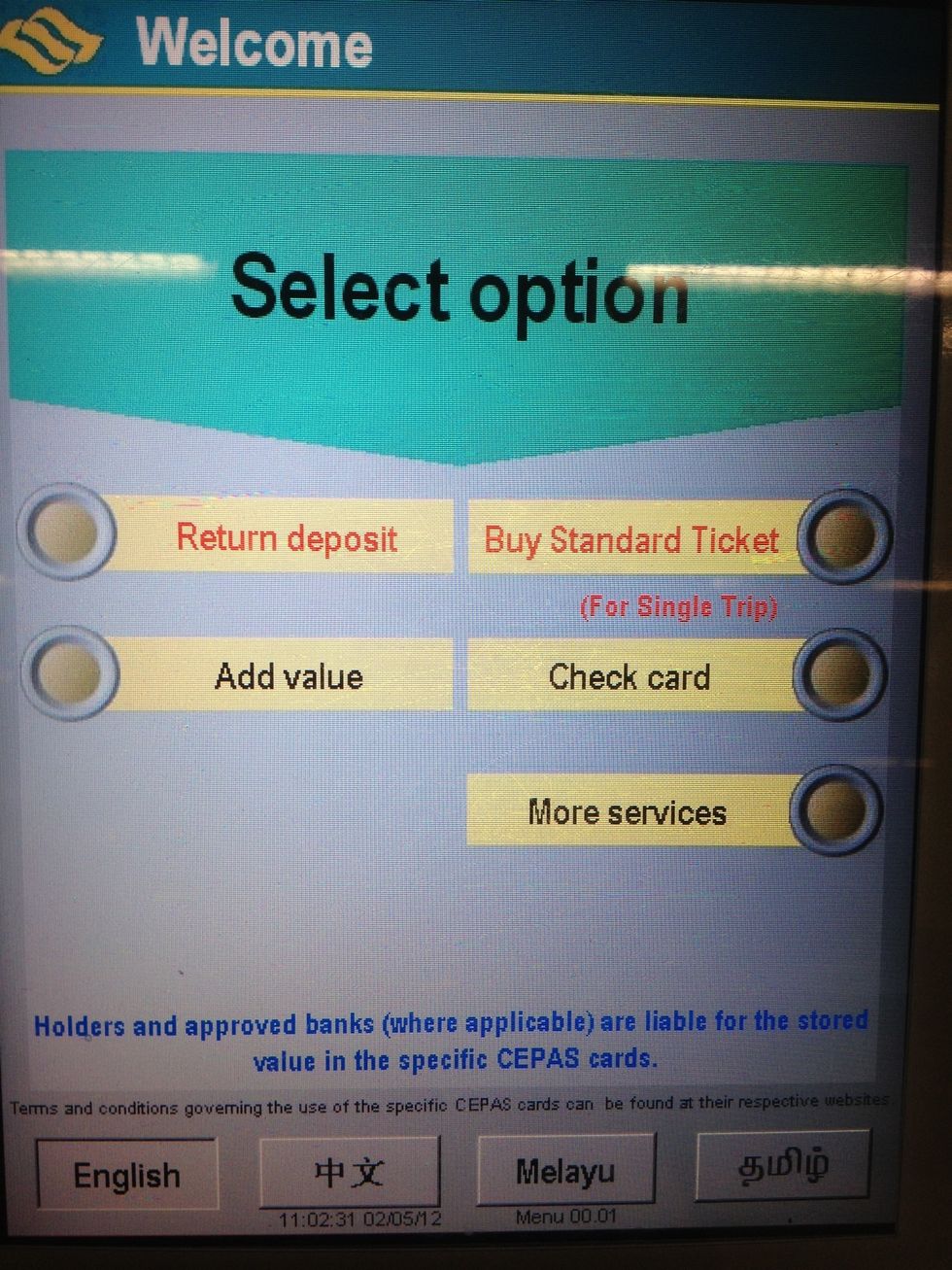 On the left side of the machine is a touch screen to display instructions. Touch "Buy Standard Ticket" to begin