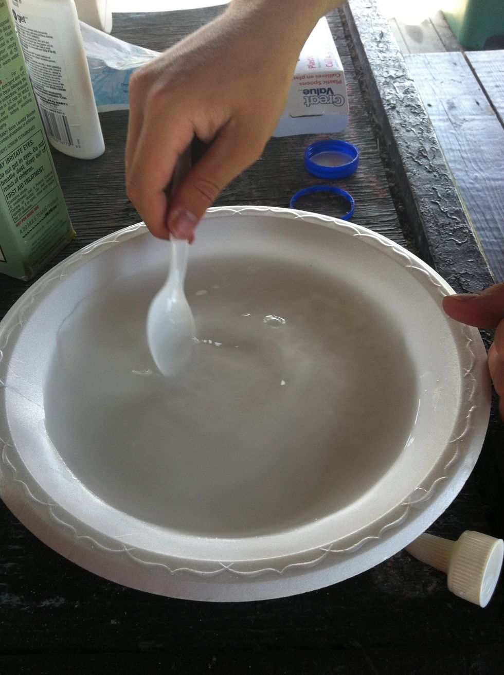 On the other plate, mix the water and borax together.