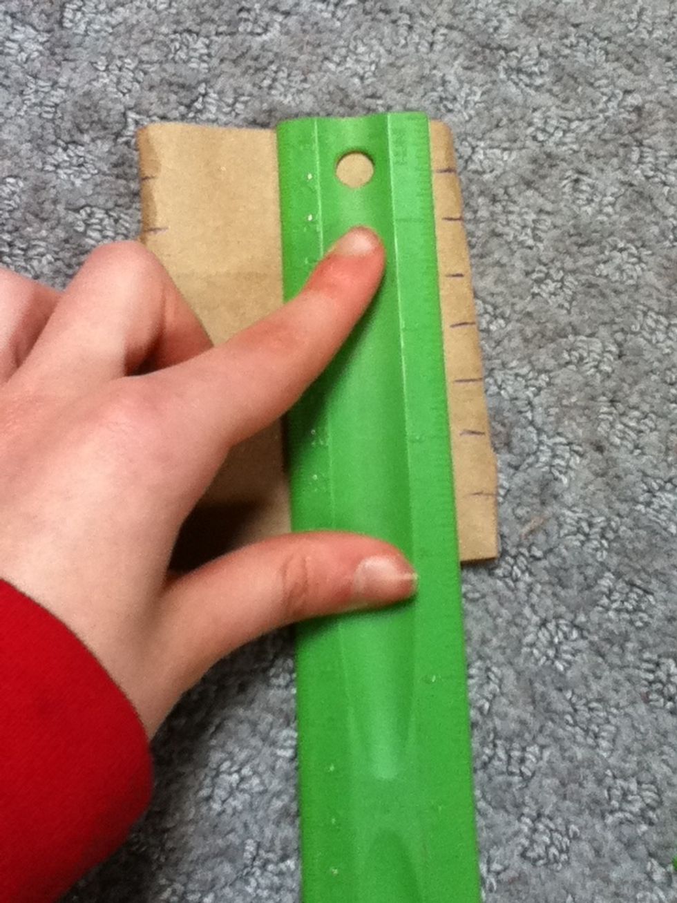 On the other side of the tube mark every 1/2 inch. Do on all tubes.