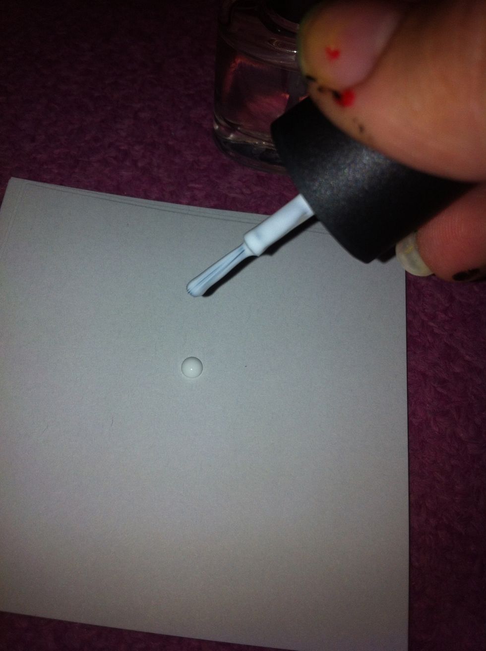 On the paper, drop the white polish.