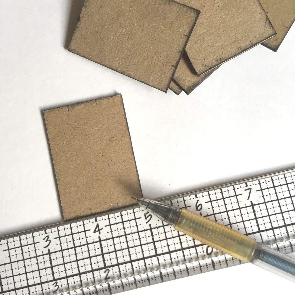 On the reverse side of the chipboards, measure in thirds; ~0.5" away from the corners... Need not to be accurate, these act as guides for the ribbons...