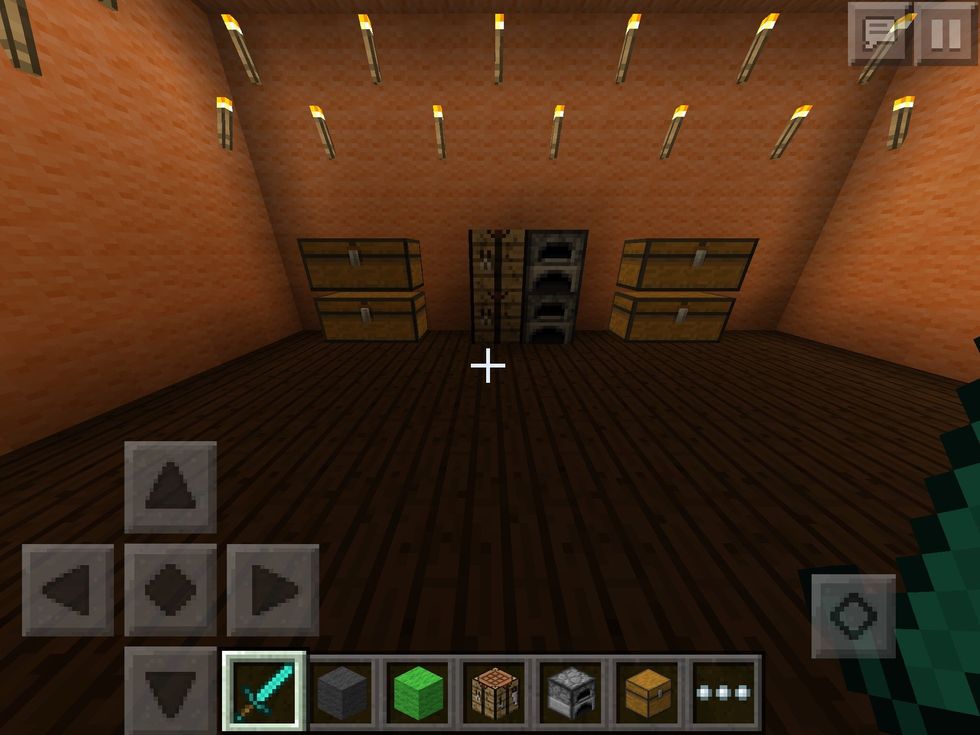 On the right side of the kitchen, add a crafting table, a furnace, and chests filled with the food that you want for the shop.