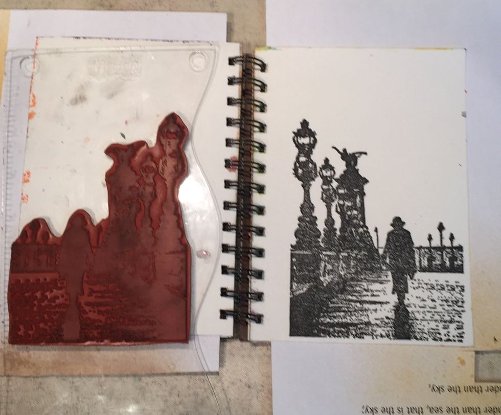 On the right side of your journal spread, stamp the Pont Alexander III stamp using Versafine ink.