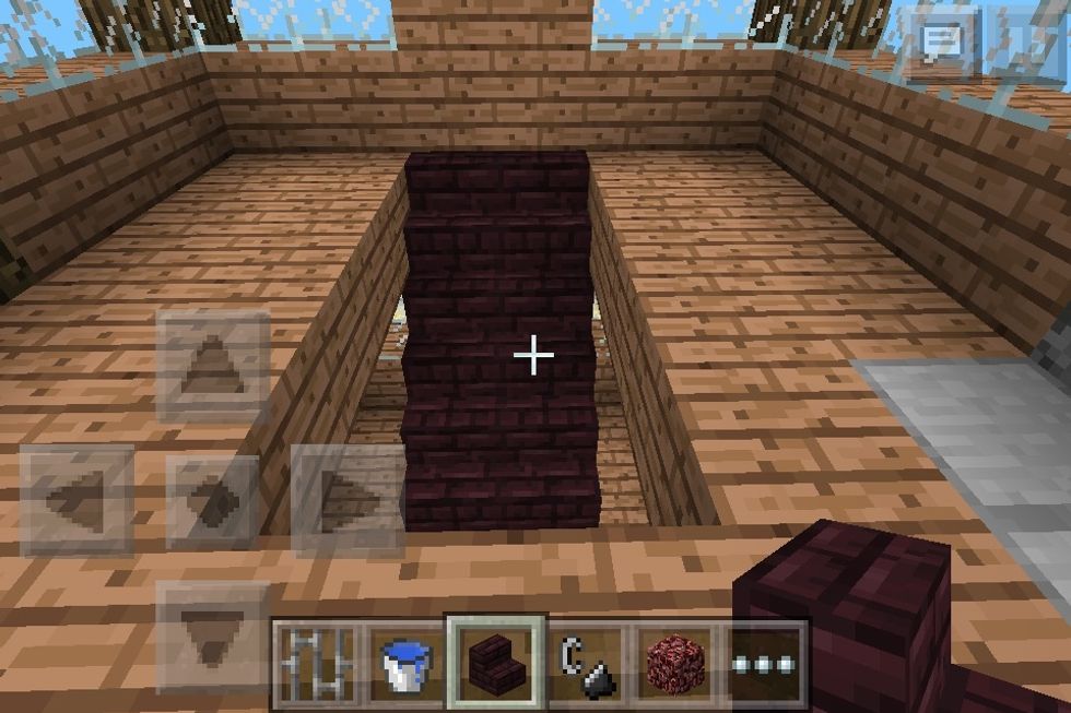 On the second floor on the opposite side make a two block wide, five block long gap. Fill both with stairs.