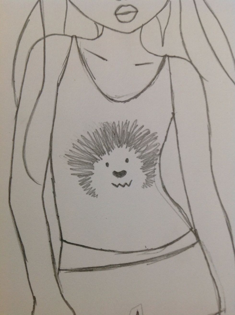 On the shirt draw a little animal face print. I did a lion