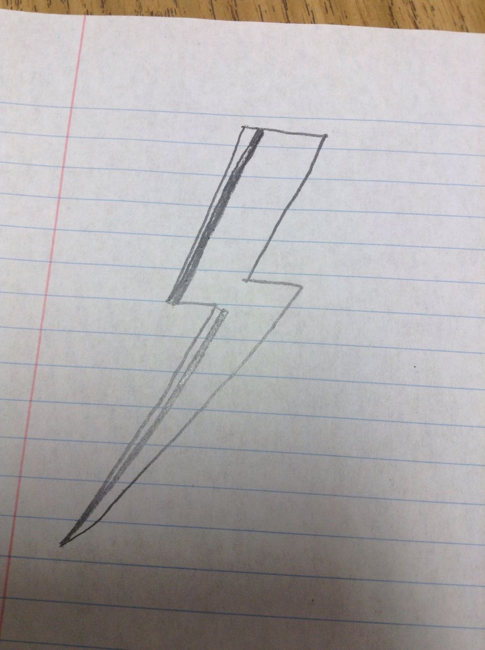 On the the left side of the bolt, draw two lines and shade one of them black