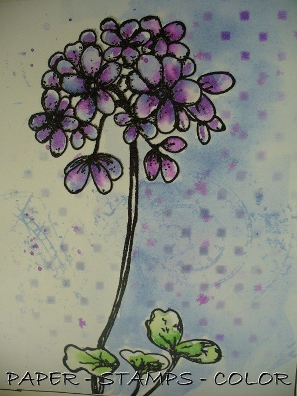 On this detailed image you can see the sponging with distress inks over the Blocked stencil.