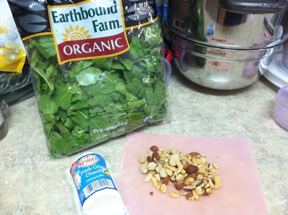 On to the salad! Buy arugula and goat cheese of your choosing.  I suggest using walnuts but I didn't have any of those, so I used whatever nuts I had on hand, still fantastic with almonds and cashews.