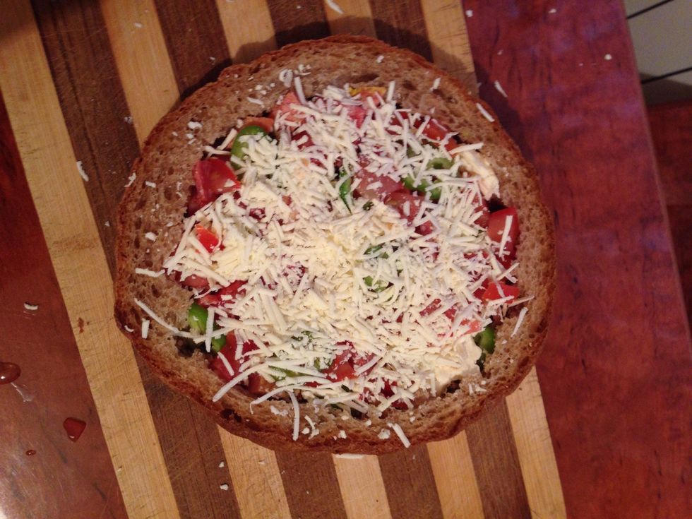 On top add some shredded cheese