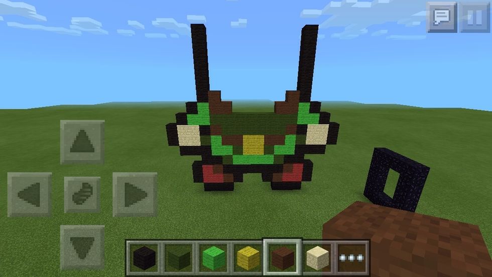 On top of the dark green, make an 'L' backwards to the one you've made in lime green.