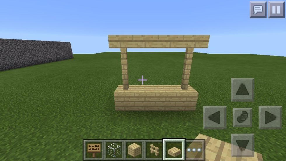 On top of the fence poles,place wooden slabs