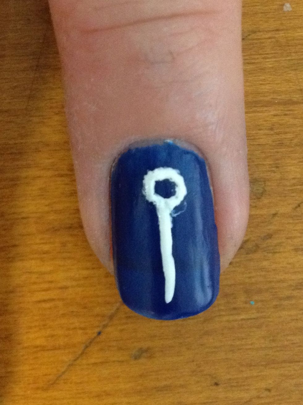 On your blue finger draw a small circle, and then a line down like so:) if u have a steadier hand than mine, that would me much better ;P