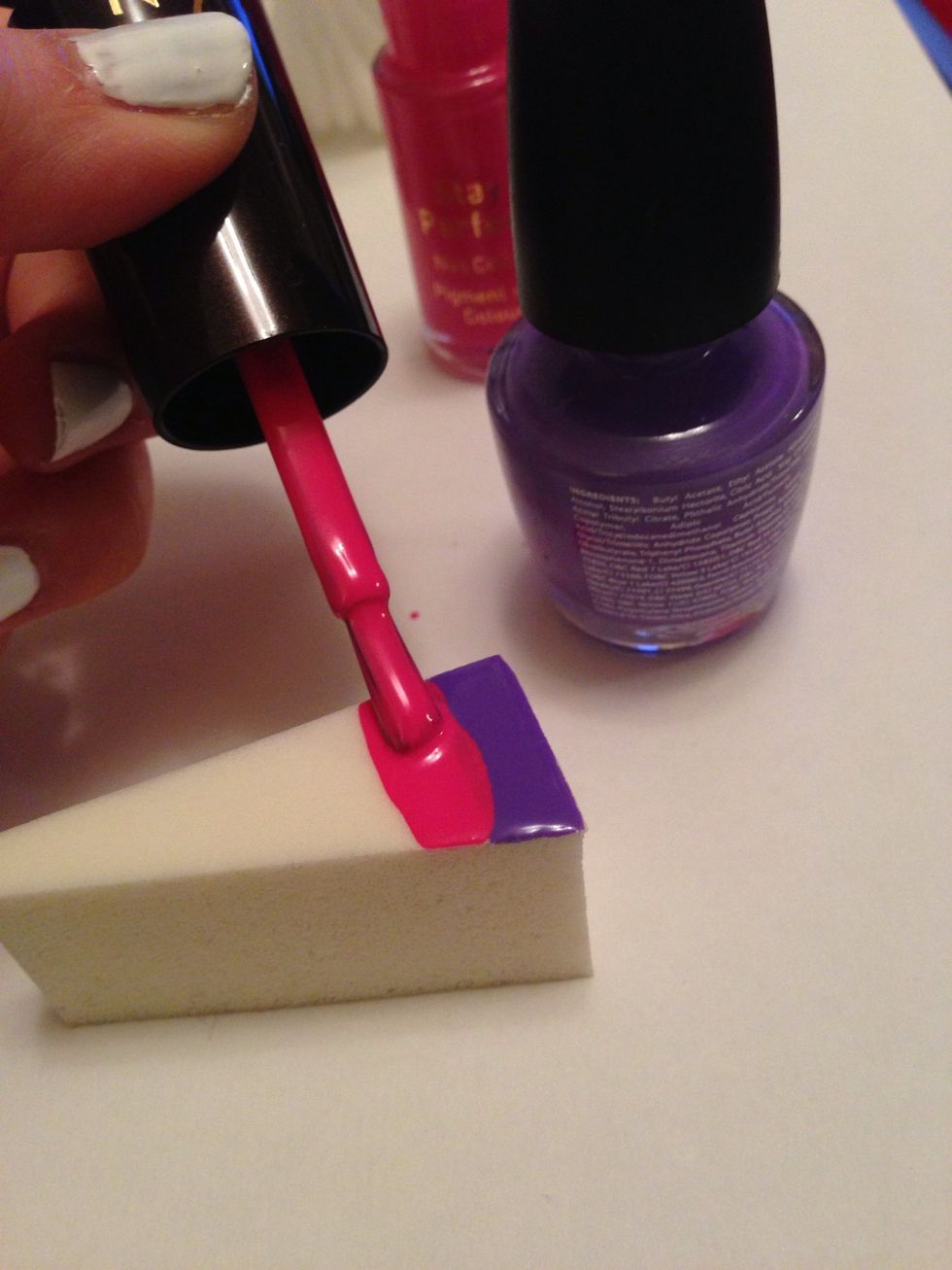 On your clean make up sponge, paint stripes of your chosen colours horizontally along. Make sure you start at the base of the sponge so you can line it up with the base of your nail.