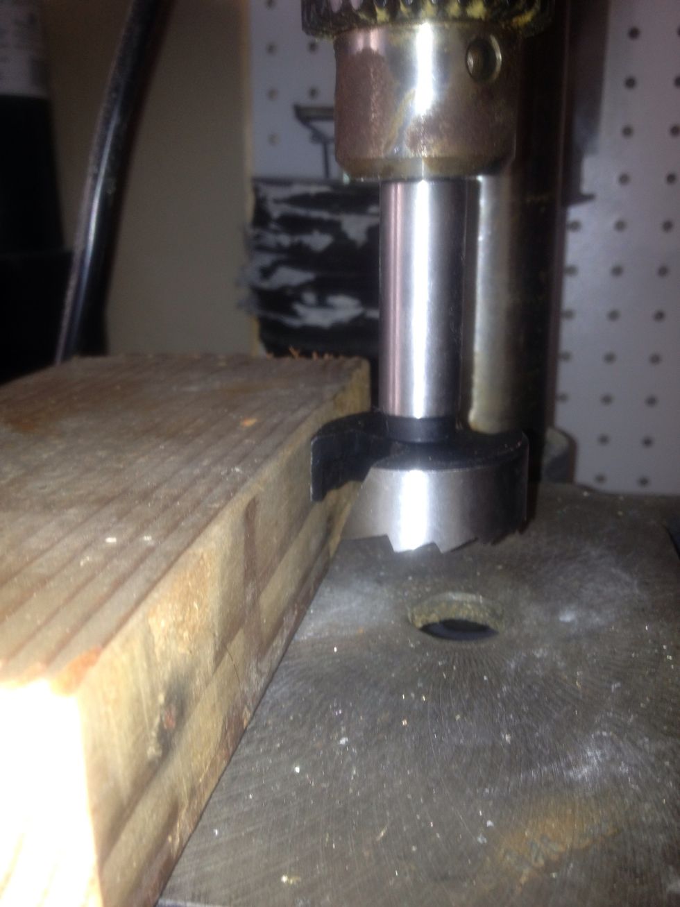 On your drill press, set the depth to the height of the tea candle