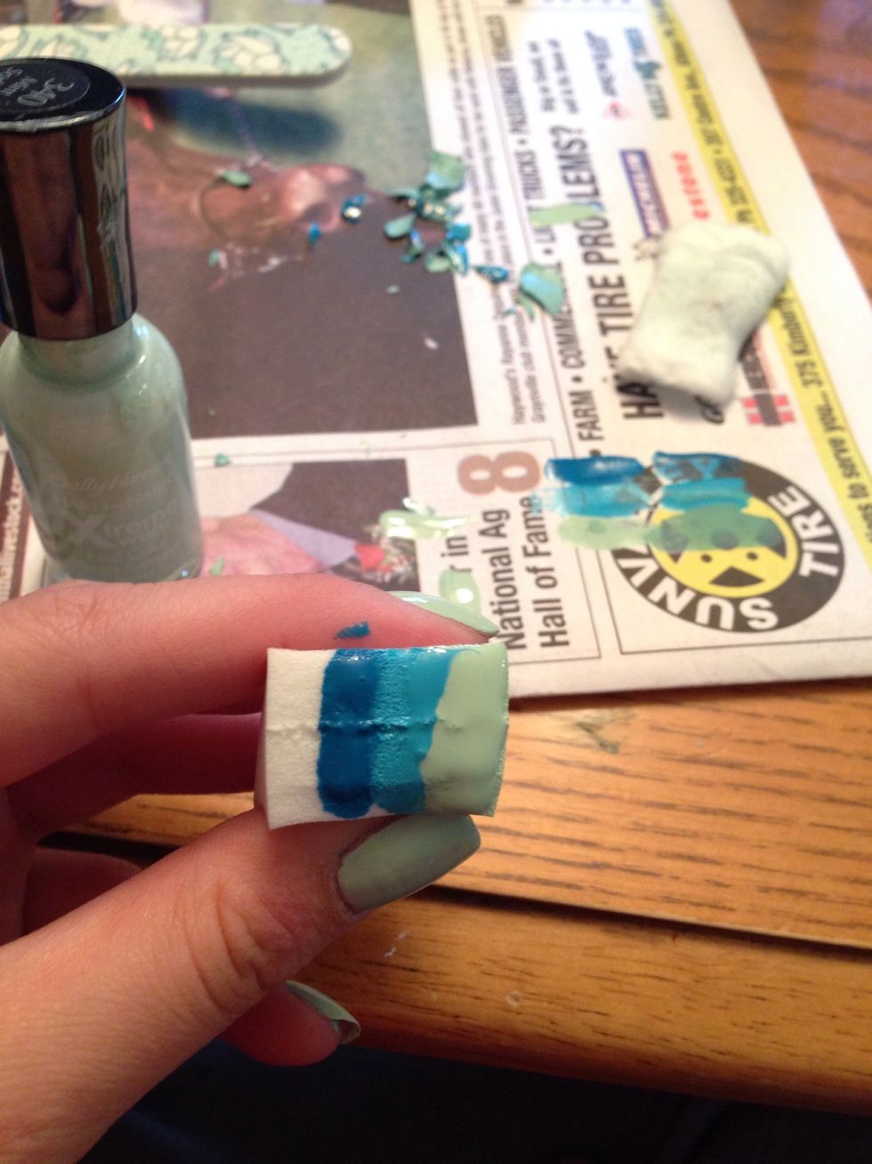 on your makeup sponge, take your nail polish colours, and make stripes of the colours in the order you want