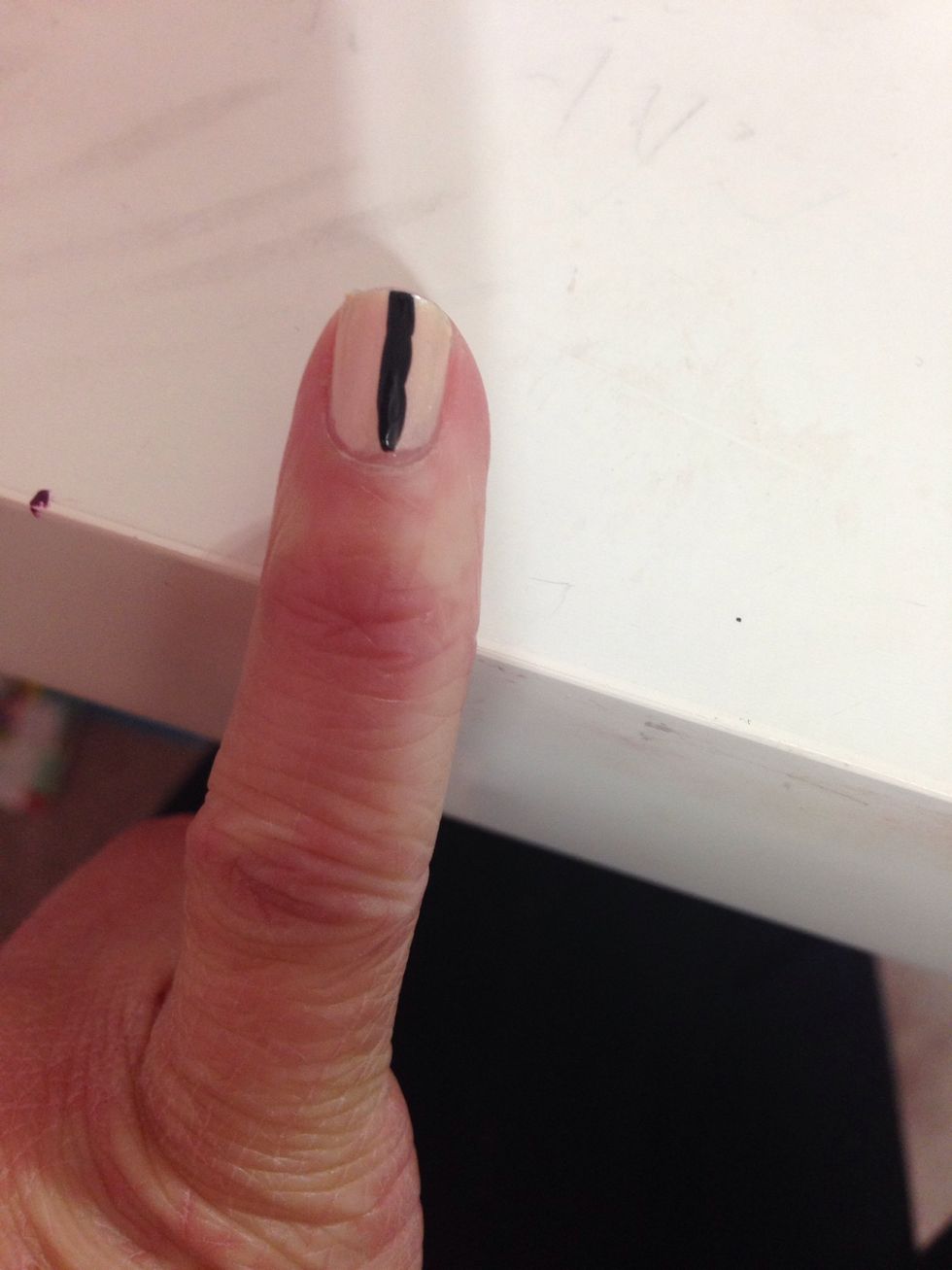 on your pinky do a vertical line