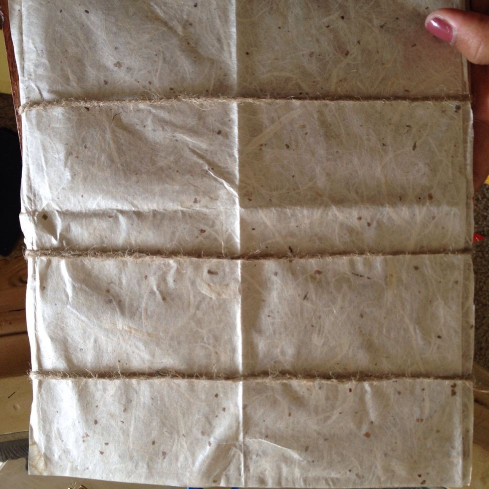 Once 10 min has passed..take your yarn or wire and wrap around your back board..