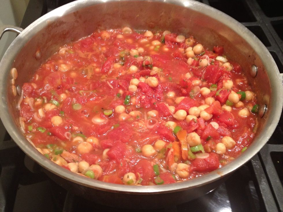 Once a boil is reached, lower the heat to a simmer. Stir in the spaghetti squash, and continue cooking for another couple of minutes.