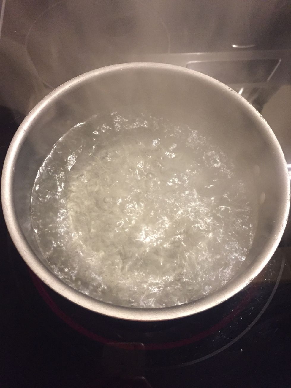 Once a full rolling boil is reached, turn the heat off and remove the pot from the hot burner.