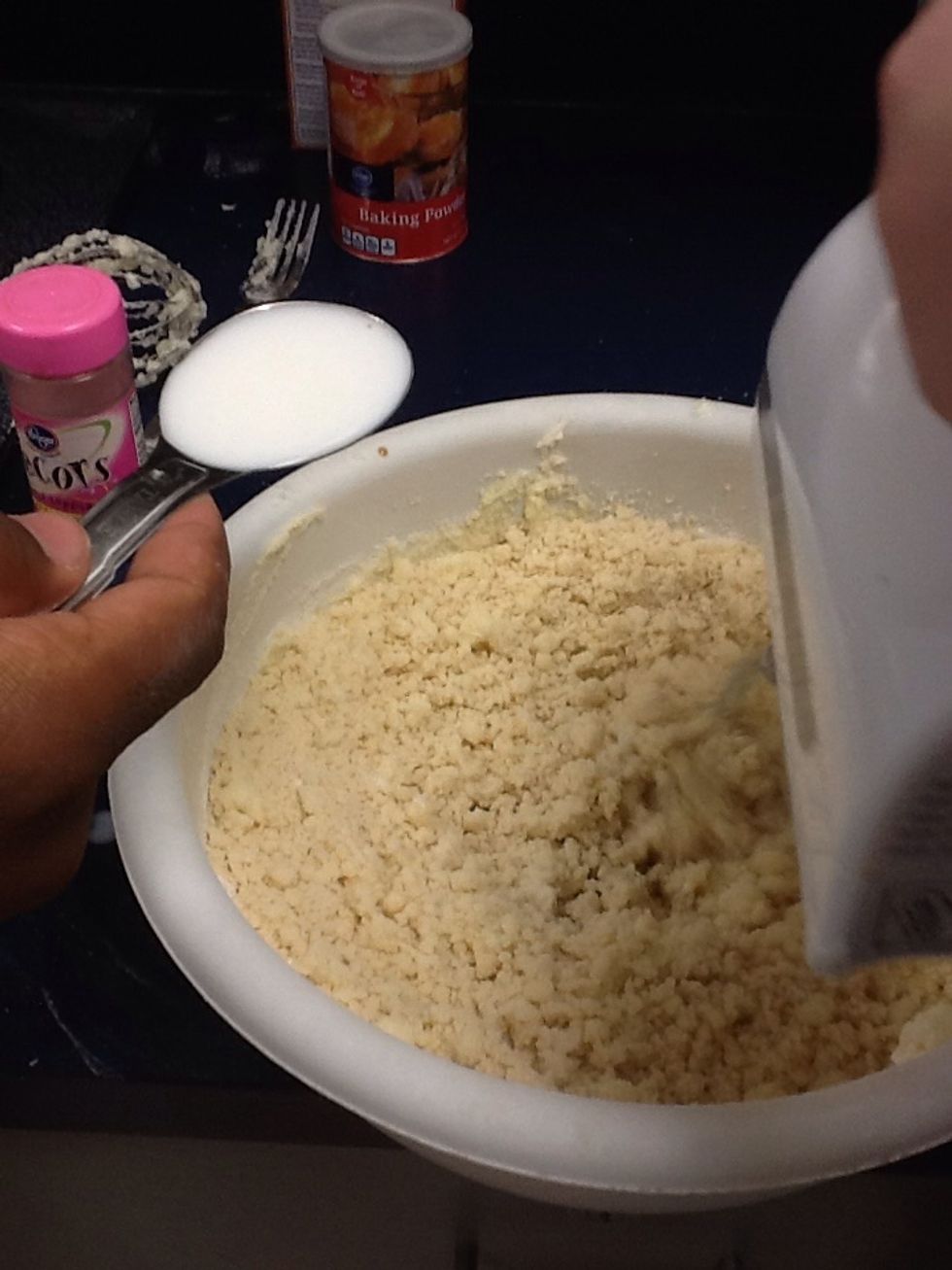 Once added, mix more and put them in balls and put them on the baking sheet