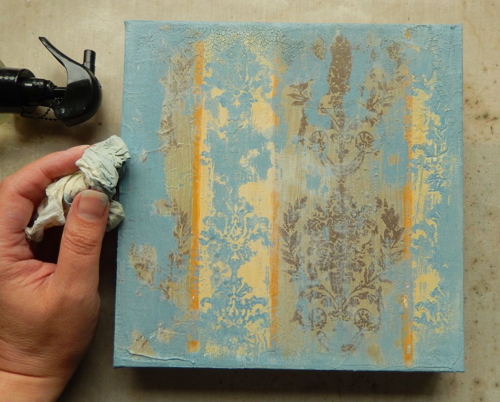 Once again dab away the wet paint areas. As before you can mist the paint with water to help this process if the paint has dried too much. Reveal as much of the pattern as required.