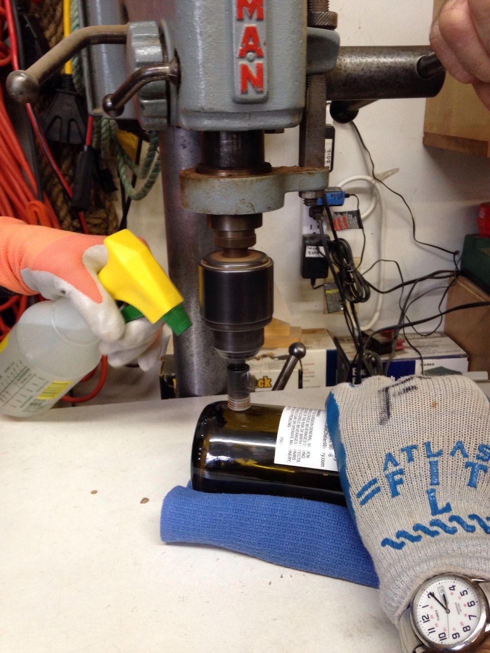 Once again, use water to lubricate the drill bit.