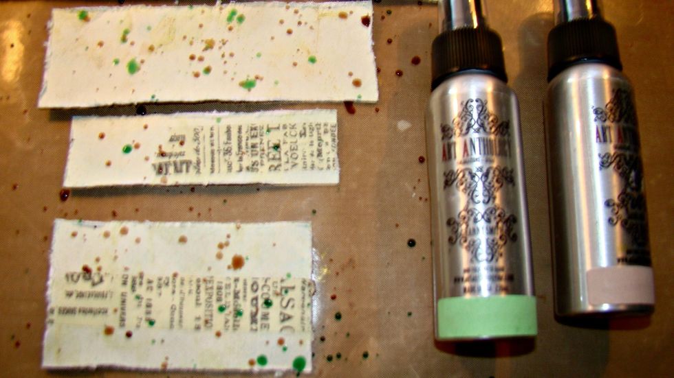 Once again using your Coloration sprays. remove the nozzle and splatter the paints on your scraps of paper.