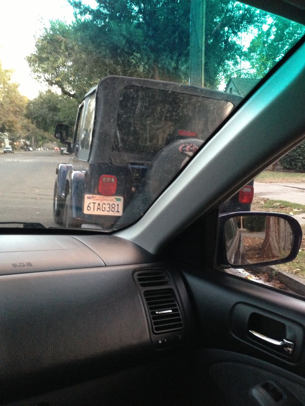 Once aligned, back straight toward that right headlight until your right front tire lines up with the left rear tire of the target car, as seen here.