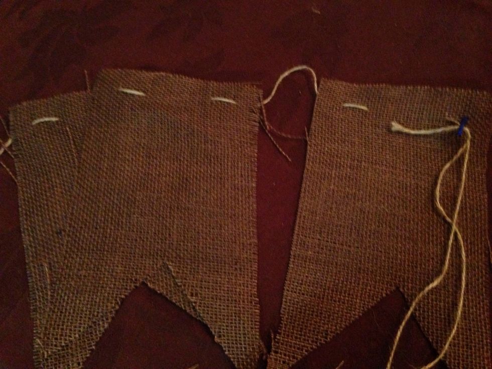 Once all 8 pieces are sewn and hanging from the twine, remember to cut extra length on either end to use for hanging or securing.