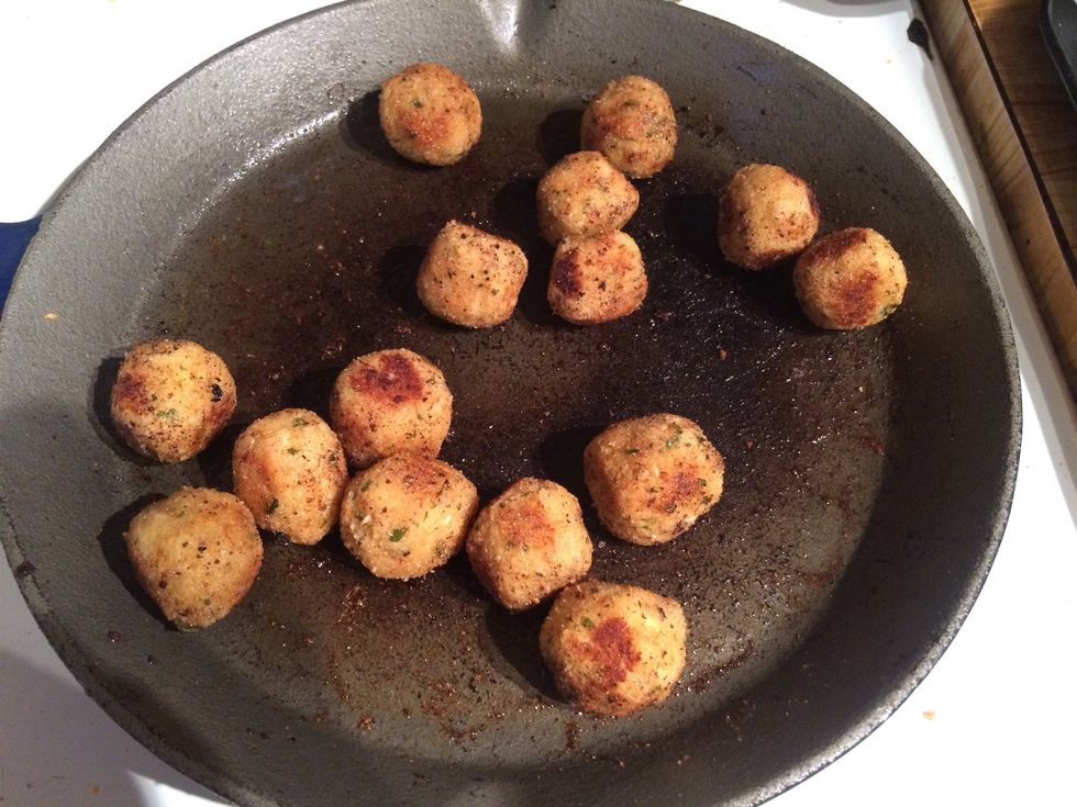 Once all balls are coated, then start frying them in a little oil. I do these in small batches. It's easier to not burn them. All you are doing is browning them!