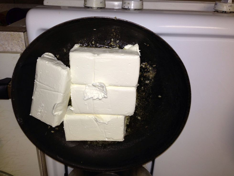 Once all butter is melted add the cream cheese. Make sure it's a low-medium heat.