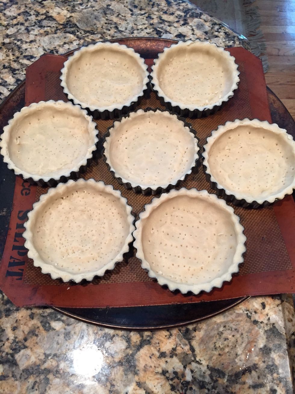 Once all shells are prepped, place on a large sheet pan.