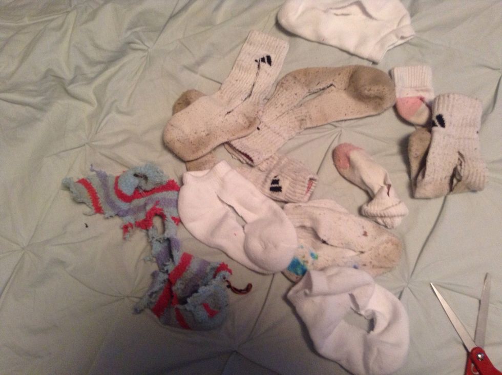 Once all socks are cut, start tying knots, every which way you can and try to double and triple knot.