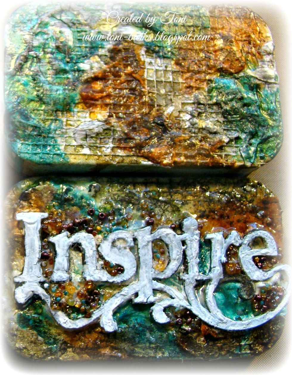 Once all that is dry I gave it another coat of white gesso to the title.