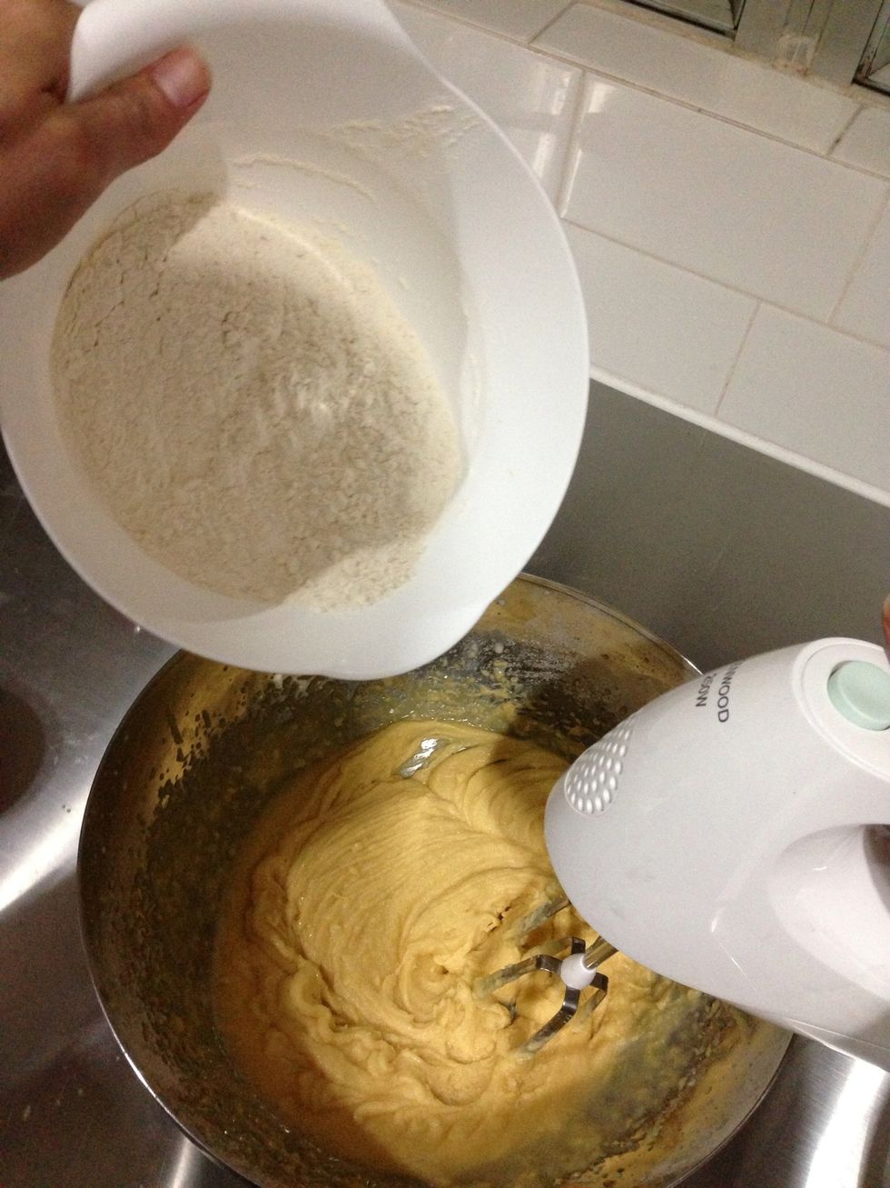 Once all the liquid ingredients combined... Gradually add the dry ingredients to the mix stopping a couple of times to scrape down the sides of the bowl... Mix until combined