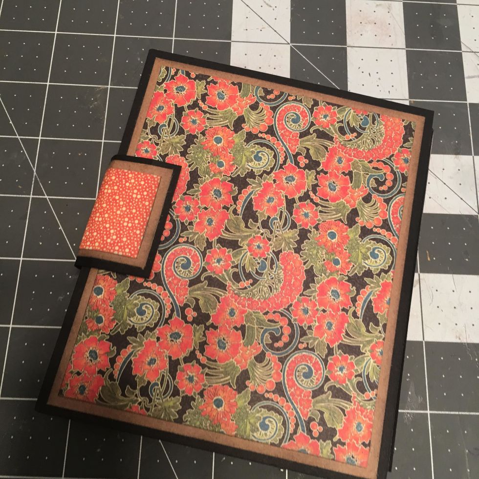 Once attached, the back should look like this. Allow to dry before opening your album.