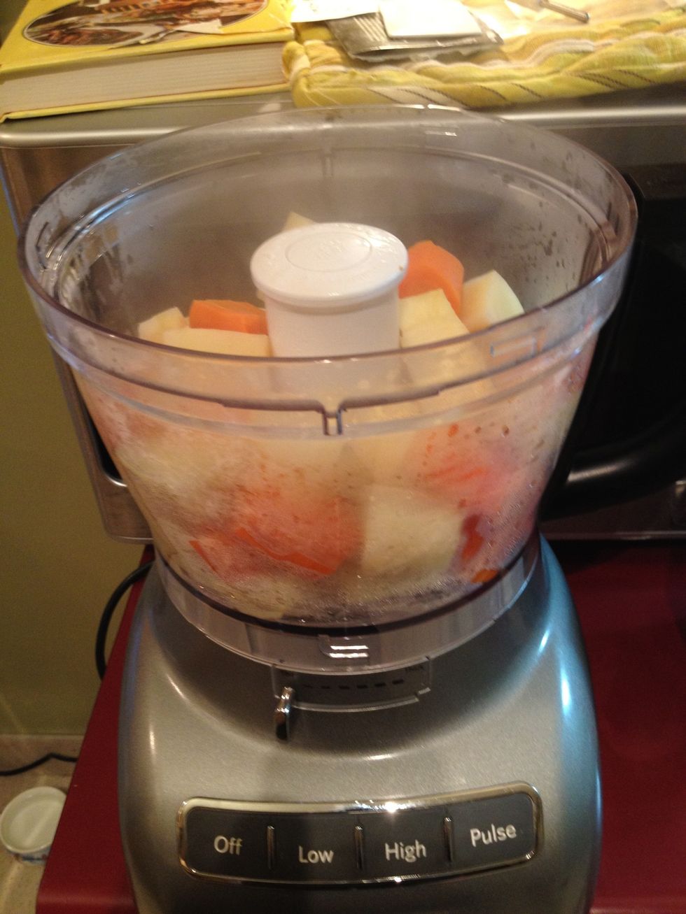 Once boiled, drain and place into food processor. If you don't have a food processor, using an electric mixer will work just fine. Heck, put them in a bowl and use a potato masher if you like!