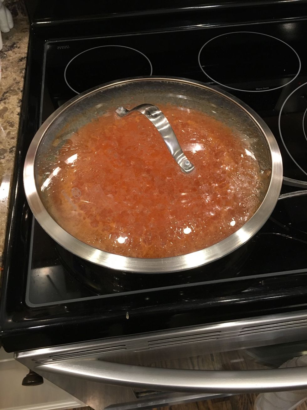 Once boiling, cover skillet, lower to medium-low heat, put cover on and let simmer for 15 minutes or until rice is tender