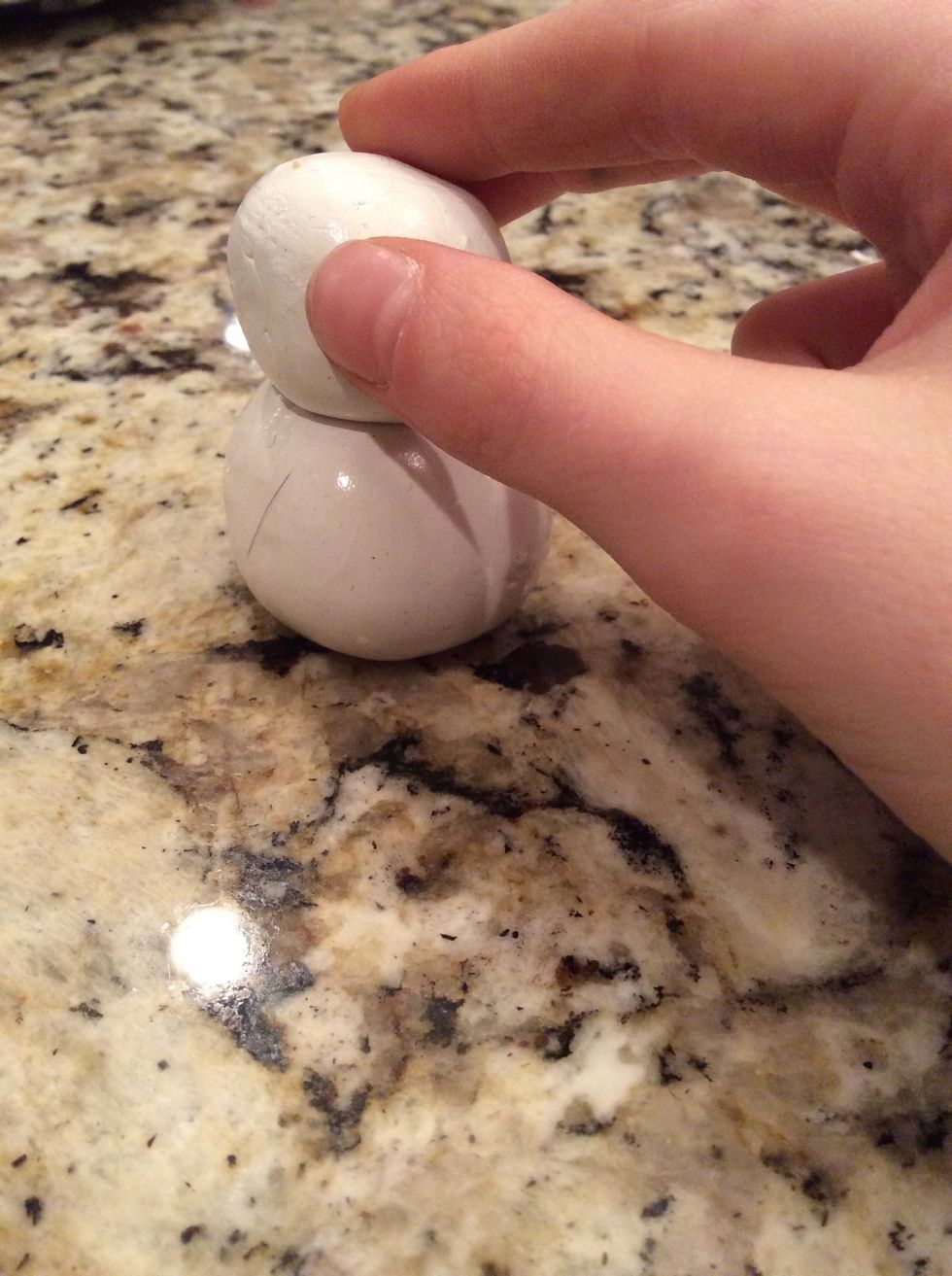 Once both pieces are rolled out stack the smaller one on top of the larger one!