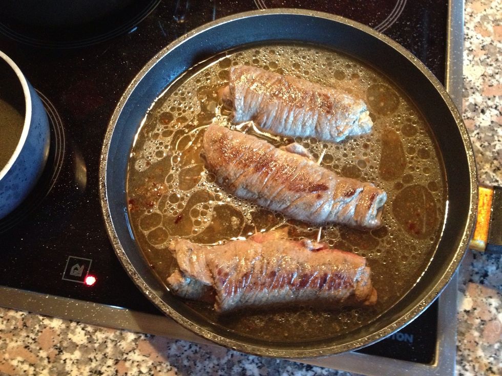 Once browned add enough water to cover the  bottom of your meat... Lower your heat to simmer...