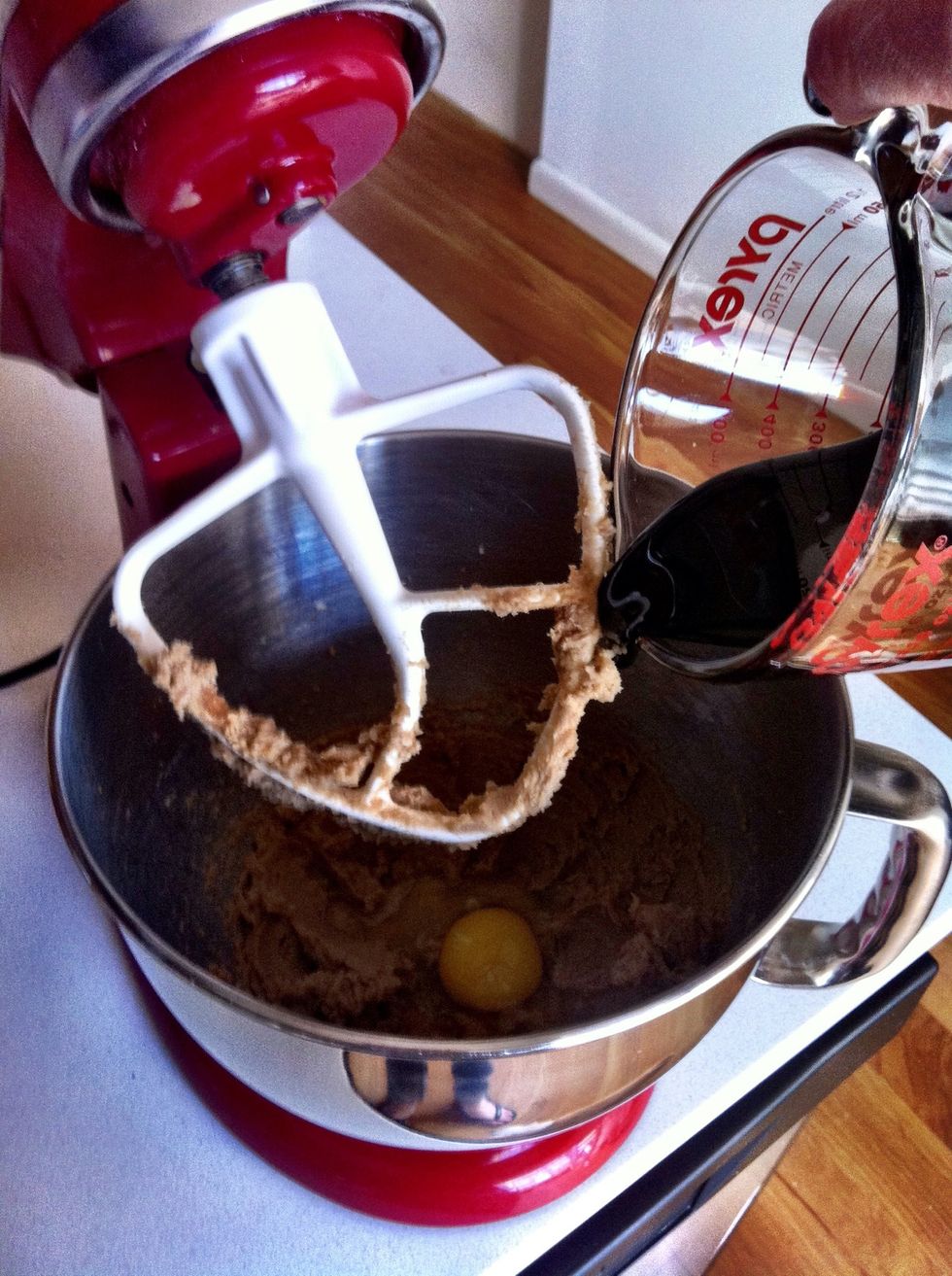 Once butter and sugar are smooth, go ahead and add the molasses and egg, and continue to beat in mixer on medium.