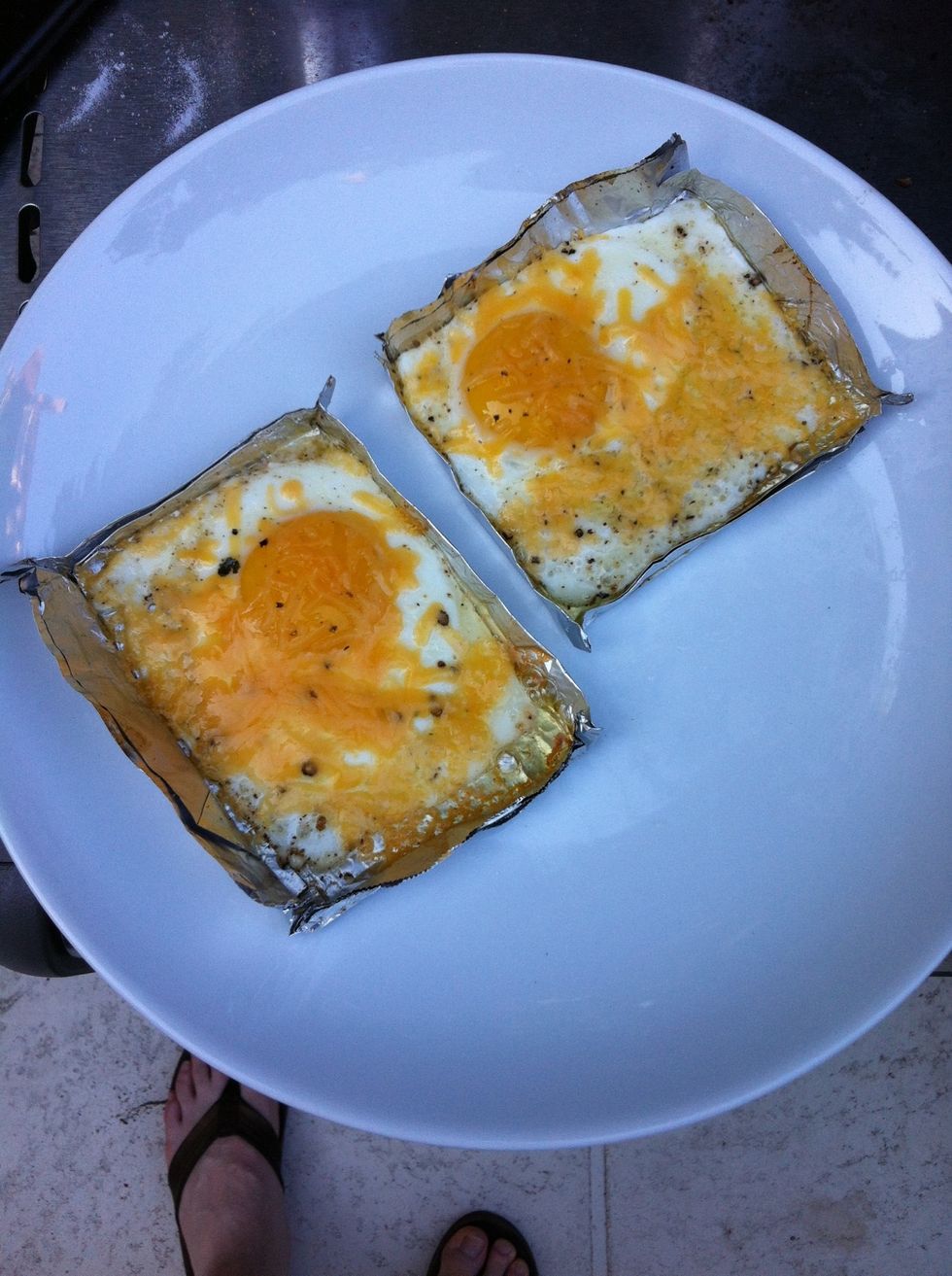 Once cheese melts, use spatula to remove foil trays.