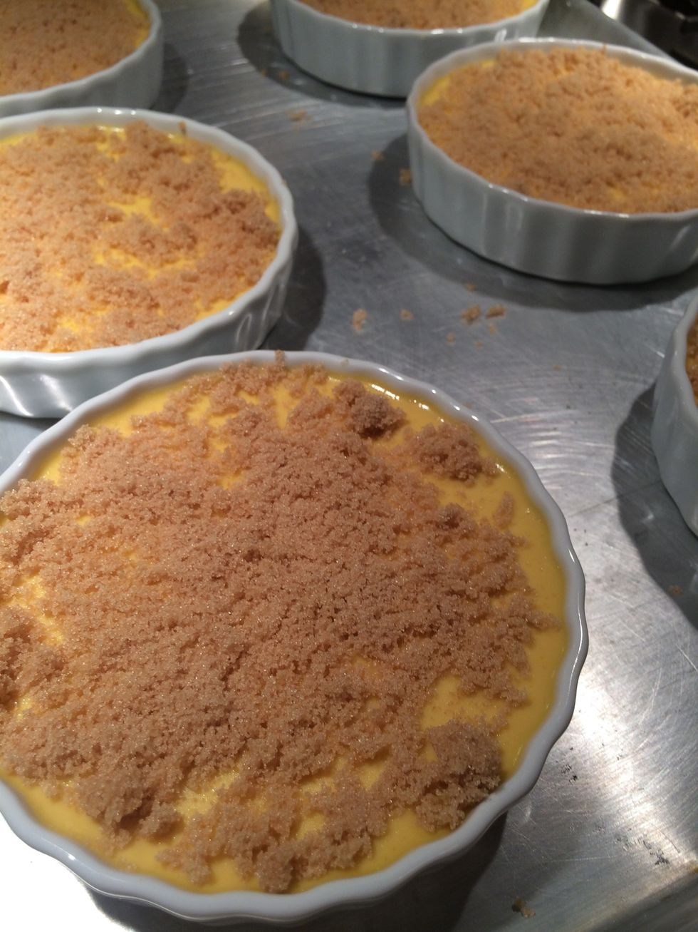 Once chilled, lightly sprinkle with brown sugar. At this point the tops can be "burned" by using a kitchen torch or in the oven using the broil setting.