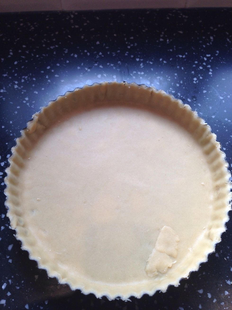 Once chilled, roll out the pastry and line a tart case
