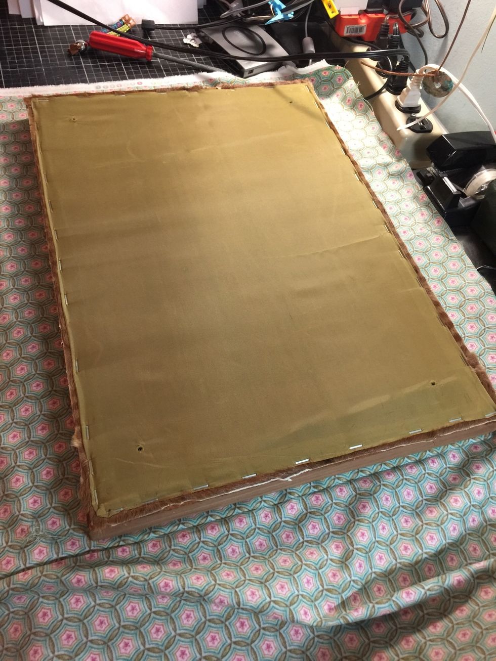 Once cleansed, started to cut the fabric by puting it down the table