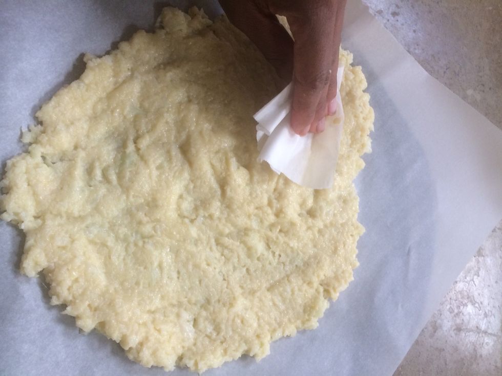 Once combined properly, pat into 10 inch round prepared pizza pan.