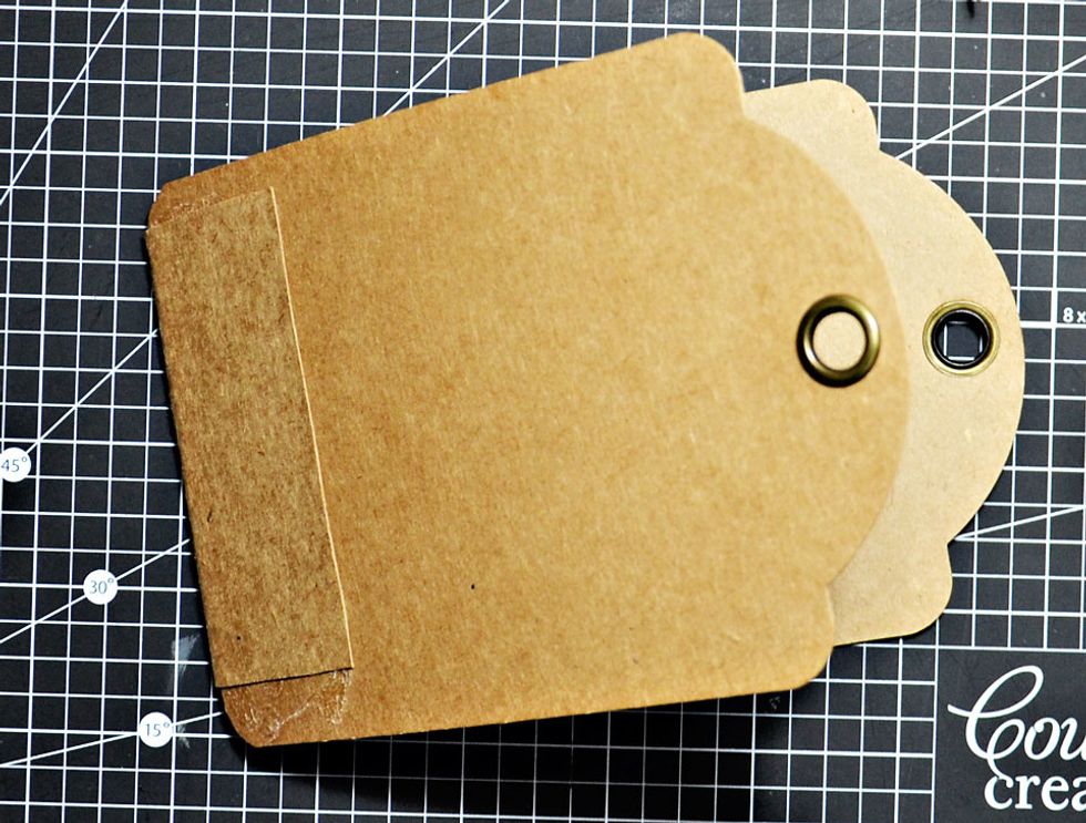 Once completed you will have a double sided tag card. This is now right to cover with your favourite papers.