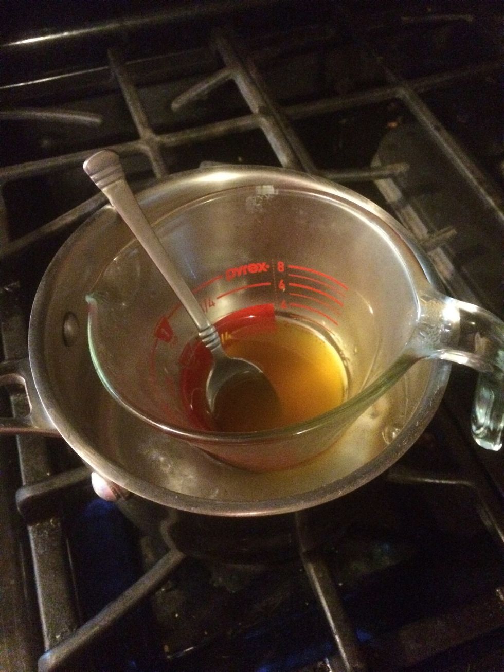 Once completely melted add almond oil.