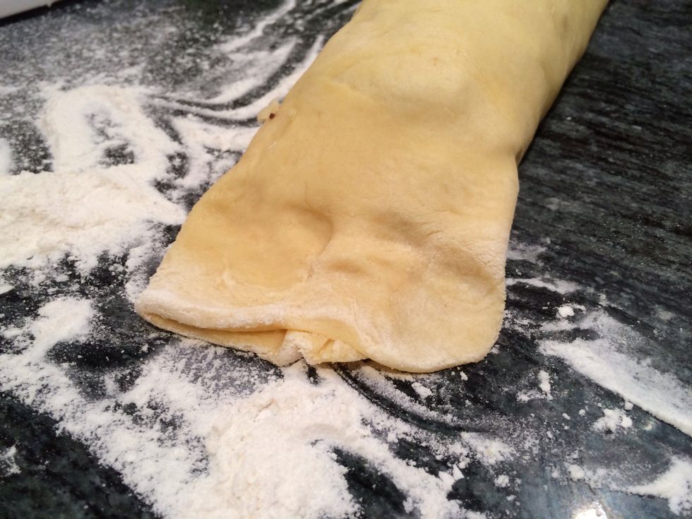 Once completely rolled pinch the ends of the dough.