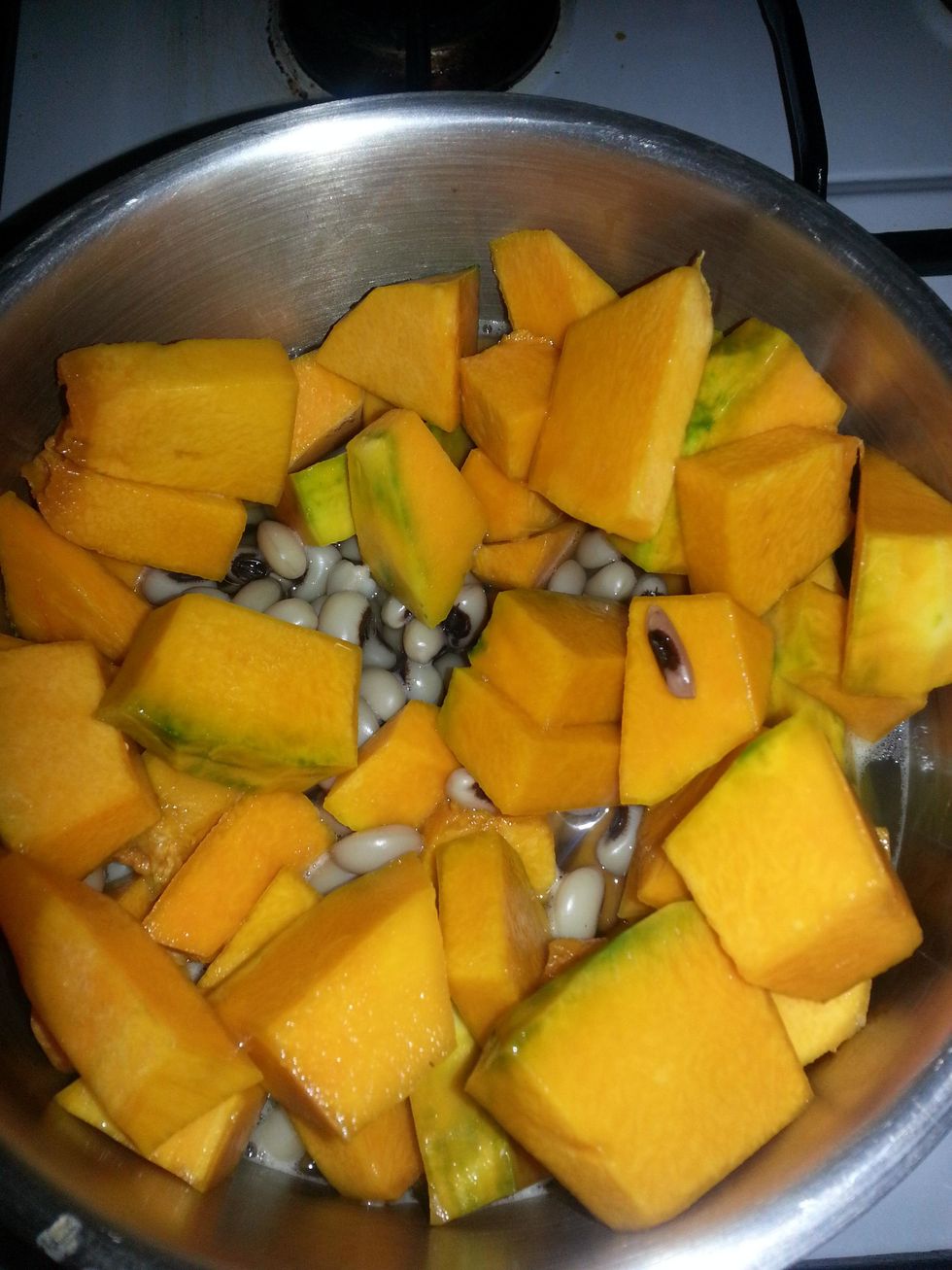Once cooked, add pumpkin, salt, turmeric and chilli powder. Cook till pumpkin is soft.